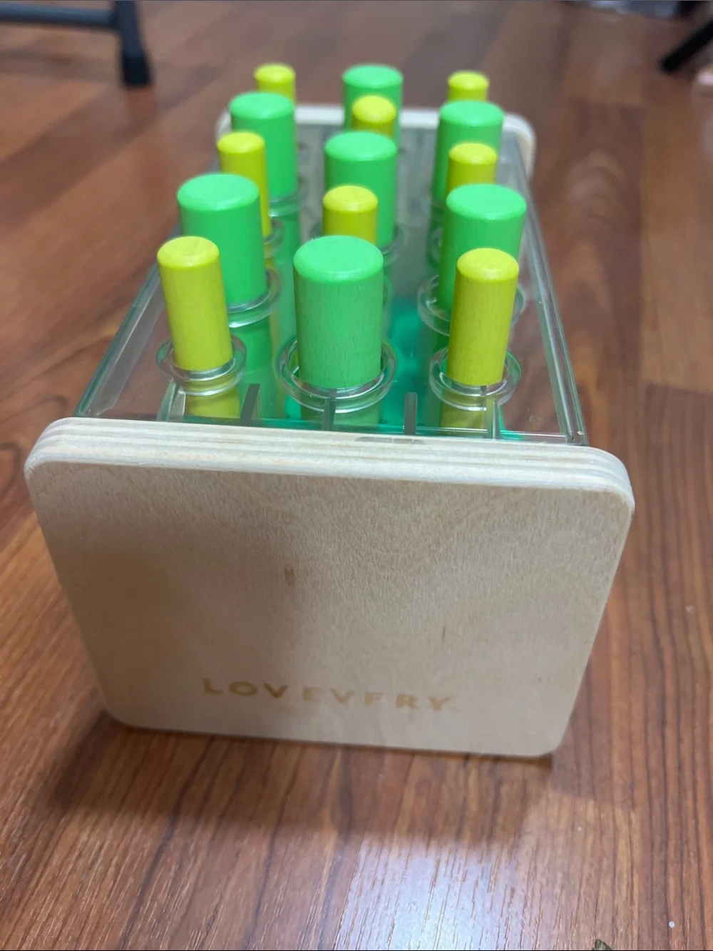 Lovevery Wooden Posting Stand Educational Toy Green and Yellow